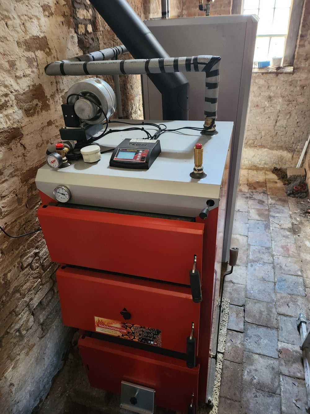 dwbi boiler installed, solid fuel boilers for grade listed homes