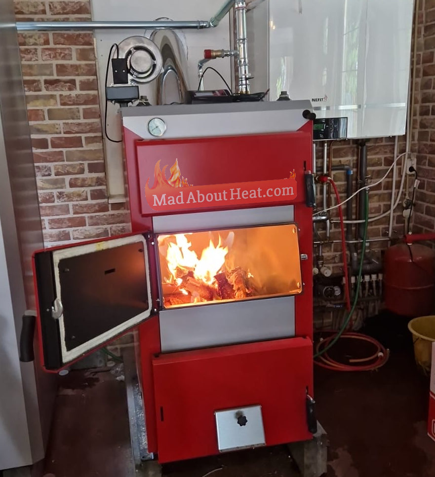 dwbi boilers, mad about heat boilers, solid fuel boiler in garage, multi fuel boiler in garage