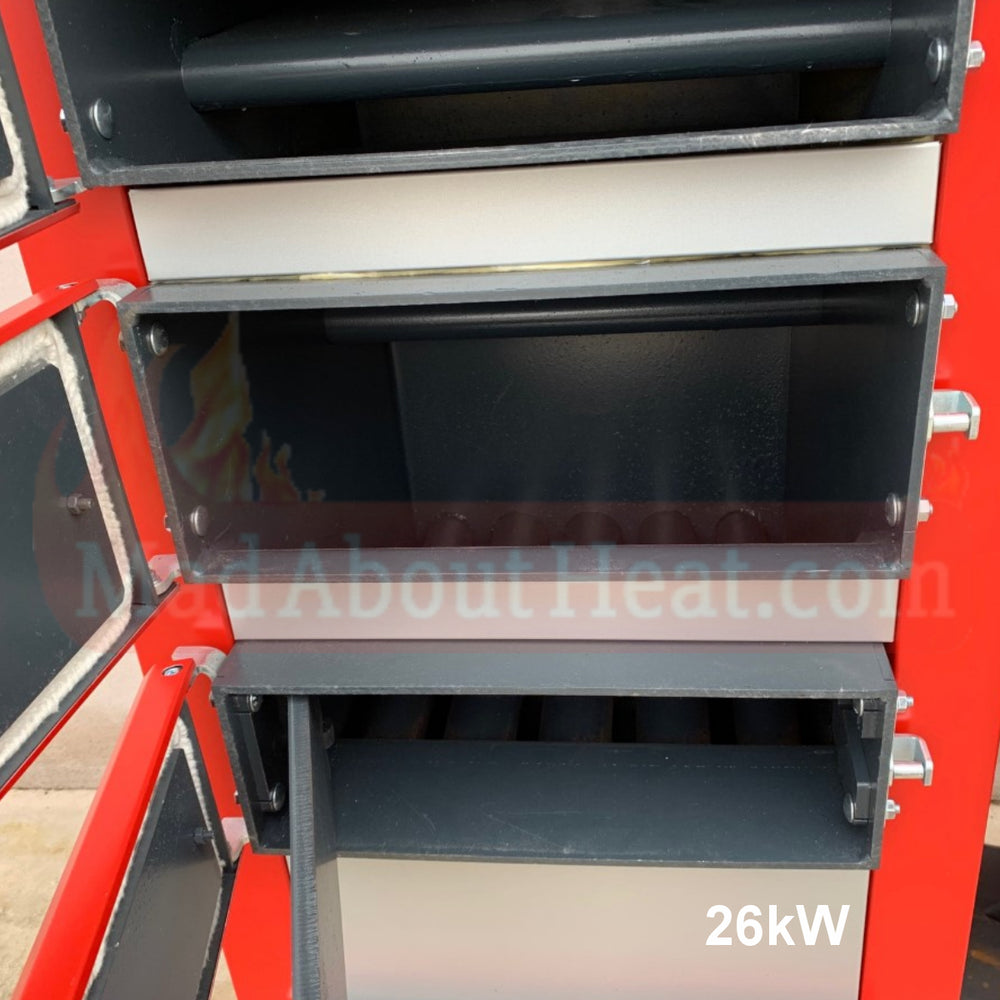 dual fuel boiler, firebox, grate, heat exchanger, boiler that burns pellets and wood,